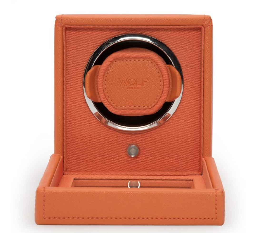 WOLF1834 Cub Winder with cover in orange vegan leather, available at Deutsch Fine Jewelry in Houston, Texas