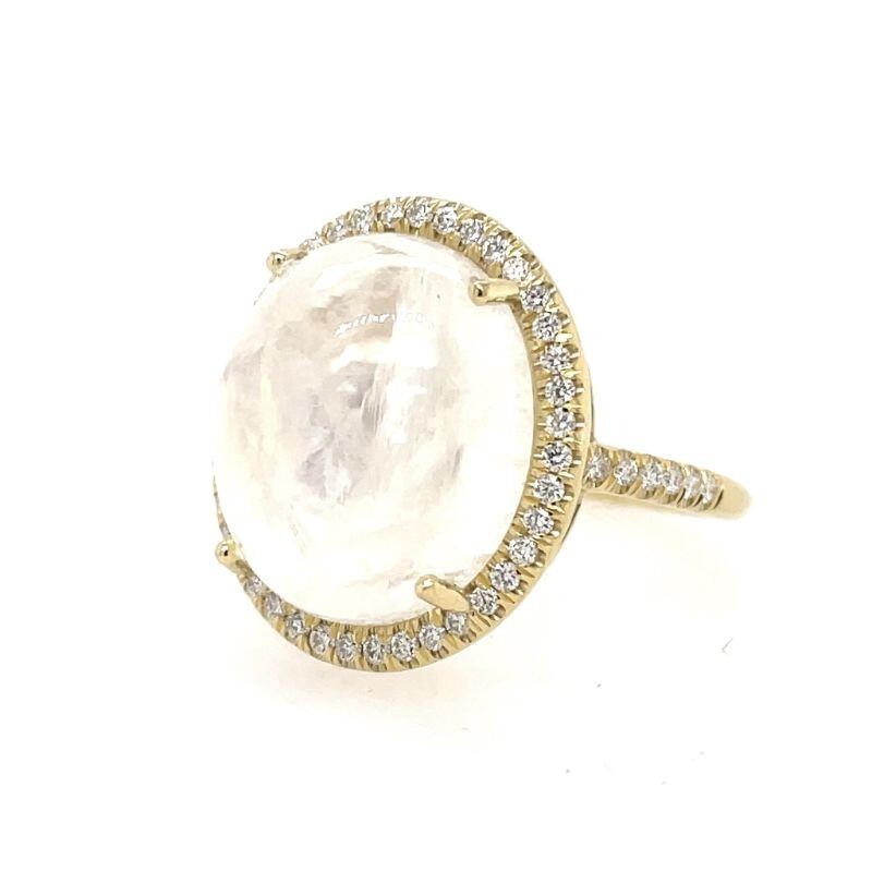 Stately Oval Cabochon Moonstone Mischa Ring with a diamond halo by Lauren K, available at Deutsch Fine Jewelry in Houston, TX.