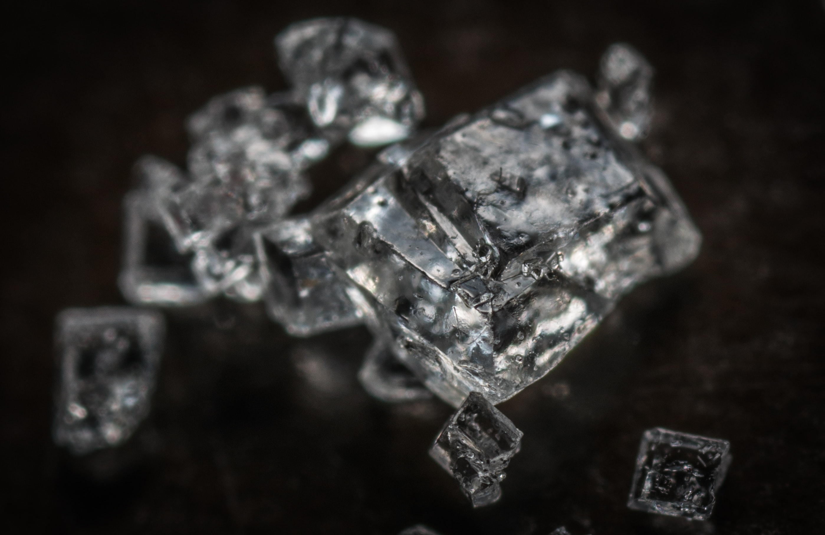 Raw diamonds on a black background