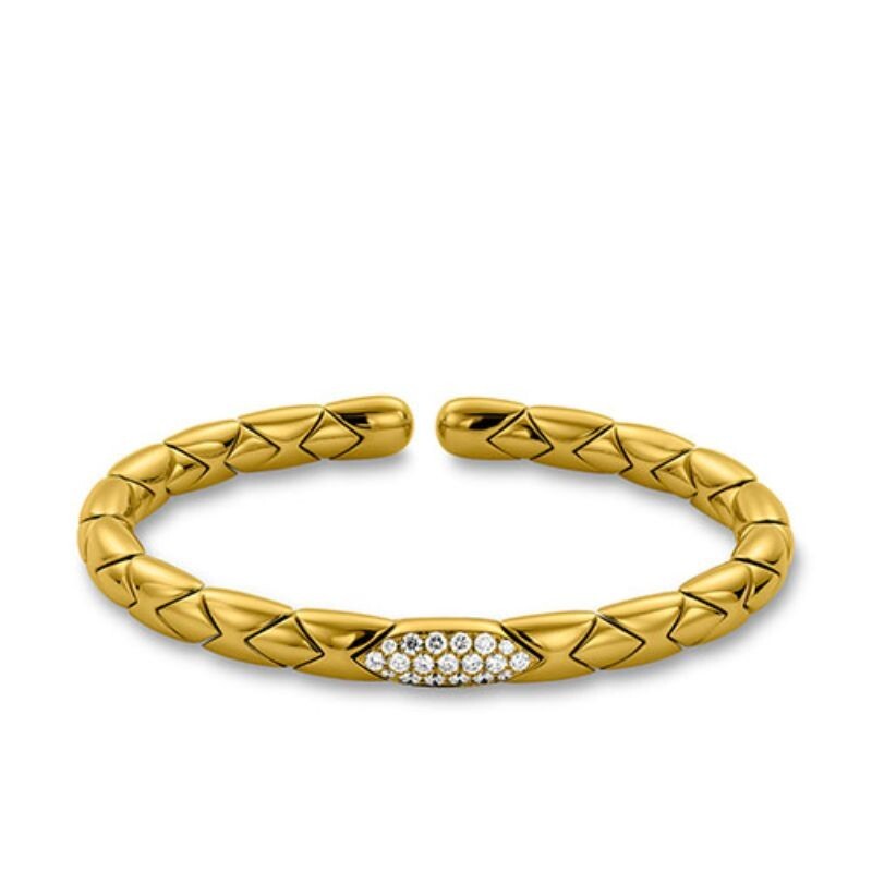 Charming yellow gold and diamond flex cuff bracelet by Hulchi Belluni, available at Deutsch Fine Jewelry in Houston, Texas.