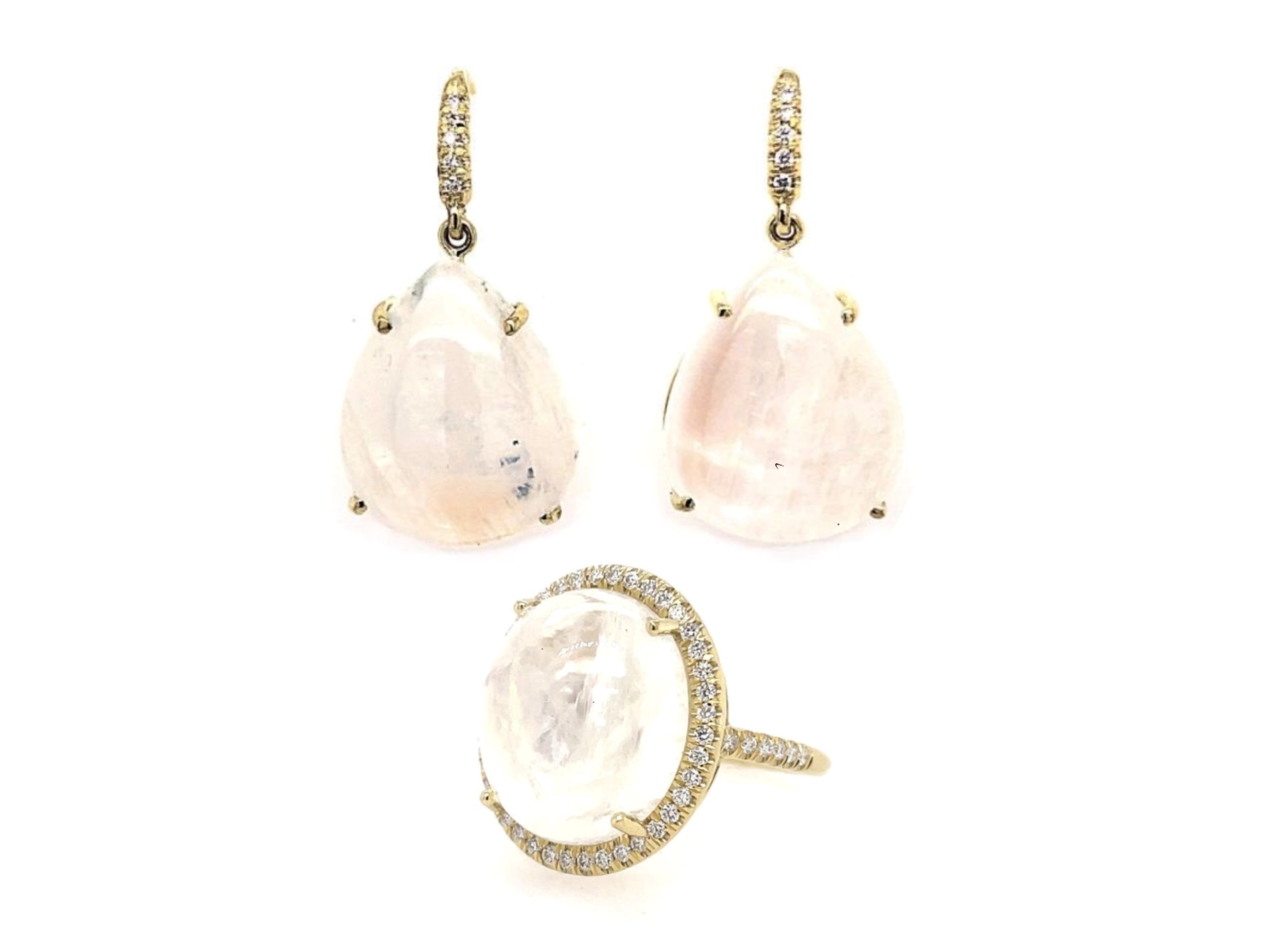 Luminescent Pear Shaped Cabochon Moonstone Earrings by Lauren K and Oval Cabochon Moonstone Misha Ring by Lauren K, available at Deutsch Fine Jewelry in Houston, Texas.