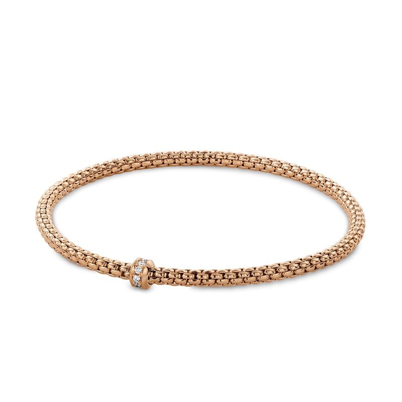 Elegant rose gold Tresore Bracelet by Hulchi Belluni with a diamond accent clasp, available at Deutsch Fine Jewelry in Houston, Texas.