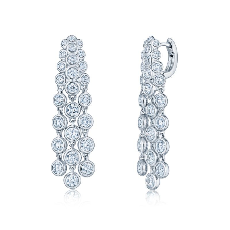 Shining white gold Kwiat Waterfall Three Row Diamond Earrings, available at Deutsch Fine Jewelry in Houston, Texas.