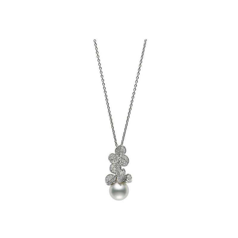 Lustrous white gold, diamond, and pearl Pendant by Mikimoto, available at Deutsch Fine Jewelry in Houston, Texas.