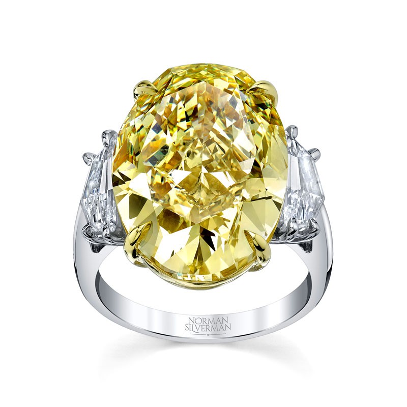 Decadent platinum and oval Yellow Diamond Ring by Norman Silverman, available at Deutsch Fine Jewelry in Houston, Texas.