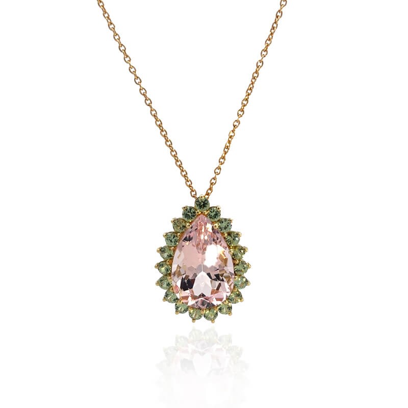 Large statement piece in pale green and pink Demantoid Halo Pendant Cable Chain by John Apel, available at Deutsch Fine Jewelry in Houston, Texas.